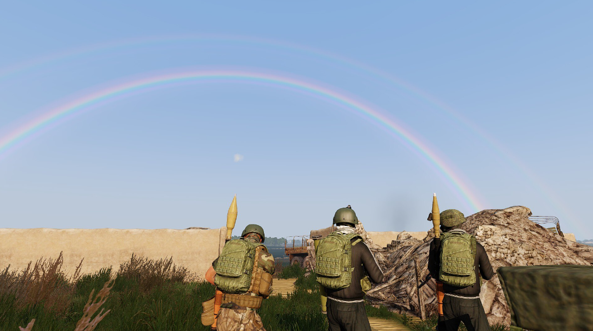 Three GFLAF fighters carrying RPGs beneath the rainbow of the covenant