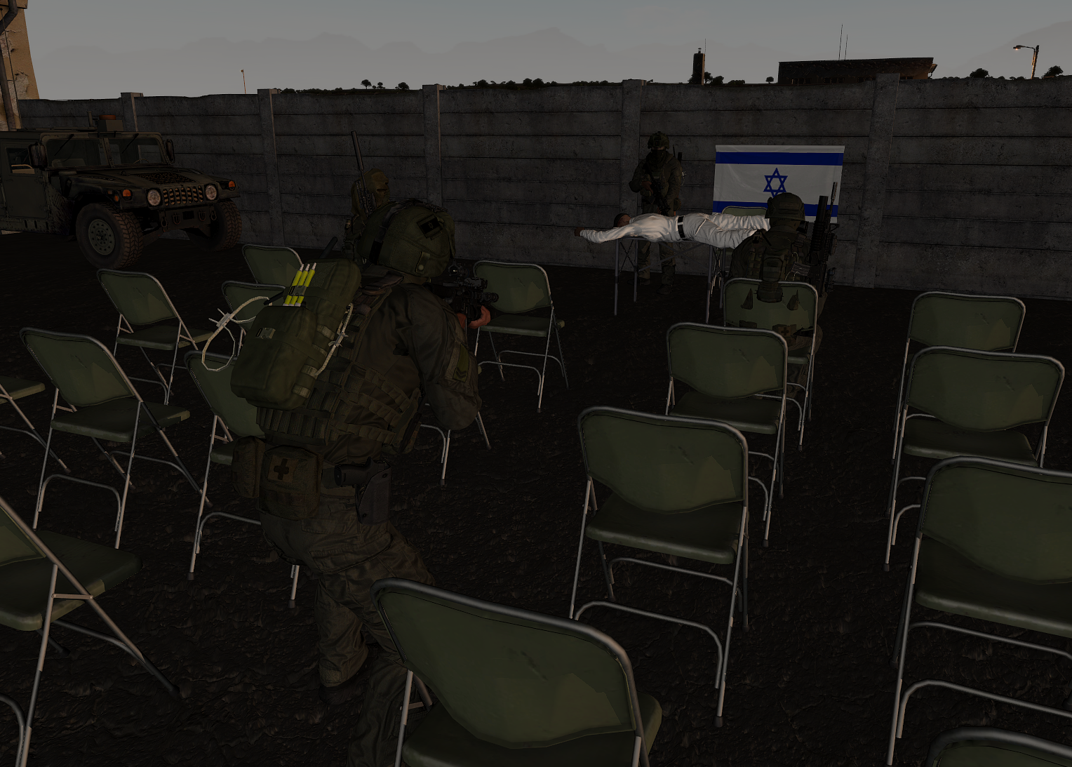 Arma soldiers assembled before an Israeli flag in a staged field scene