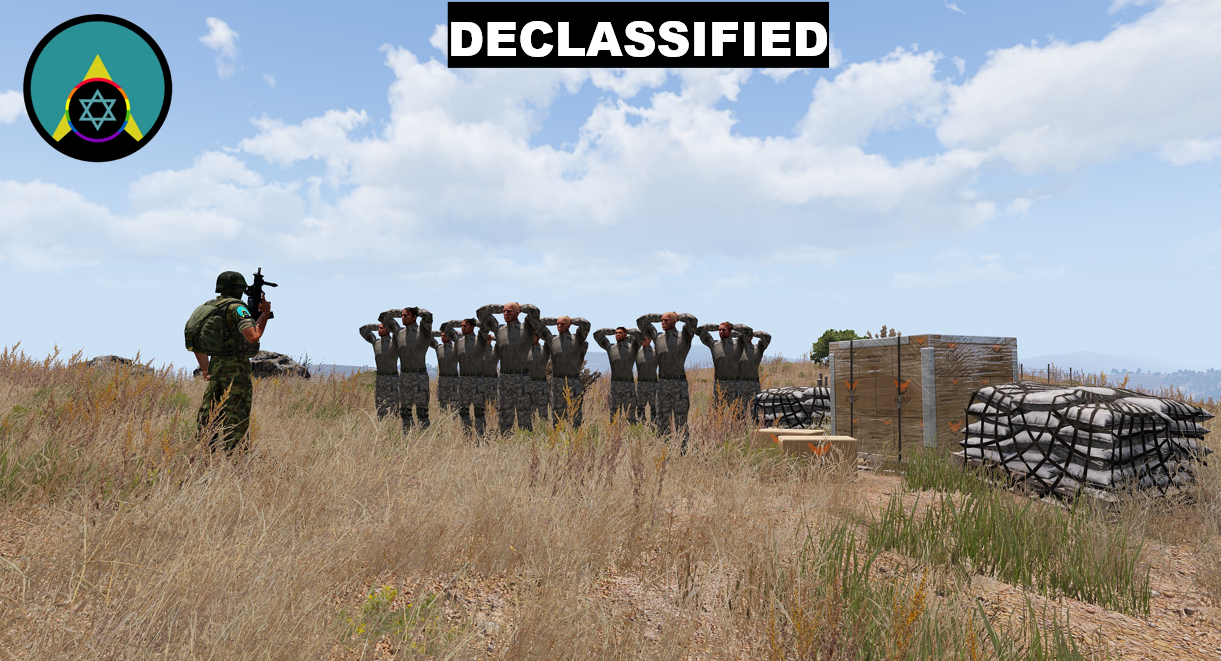 NQF fighter guarding captured prisoners near supply crates
