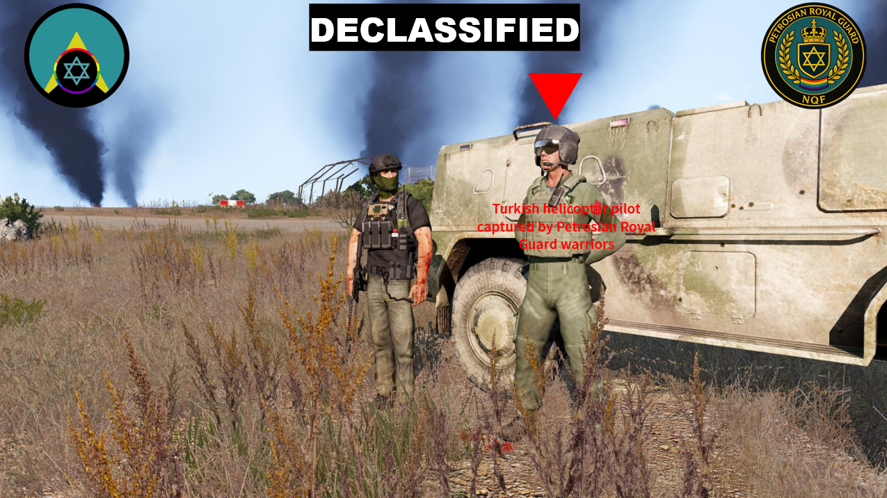 NQF fighters standing beside a captured Turkish helicopter pilot